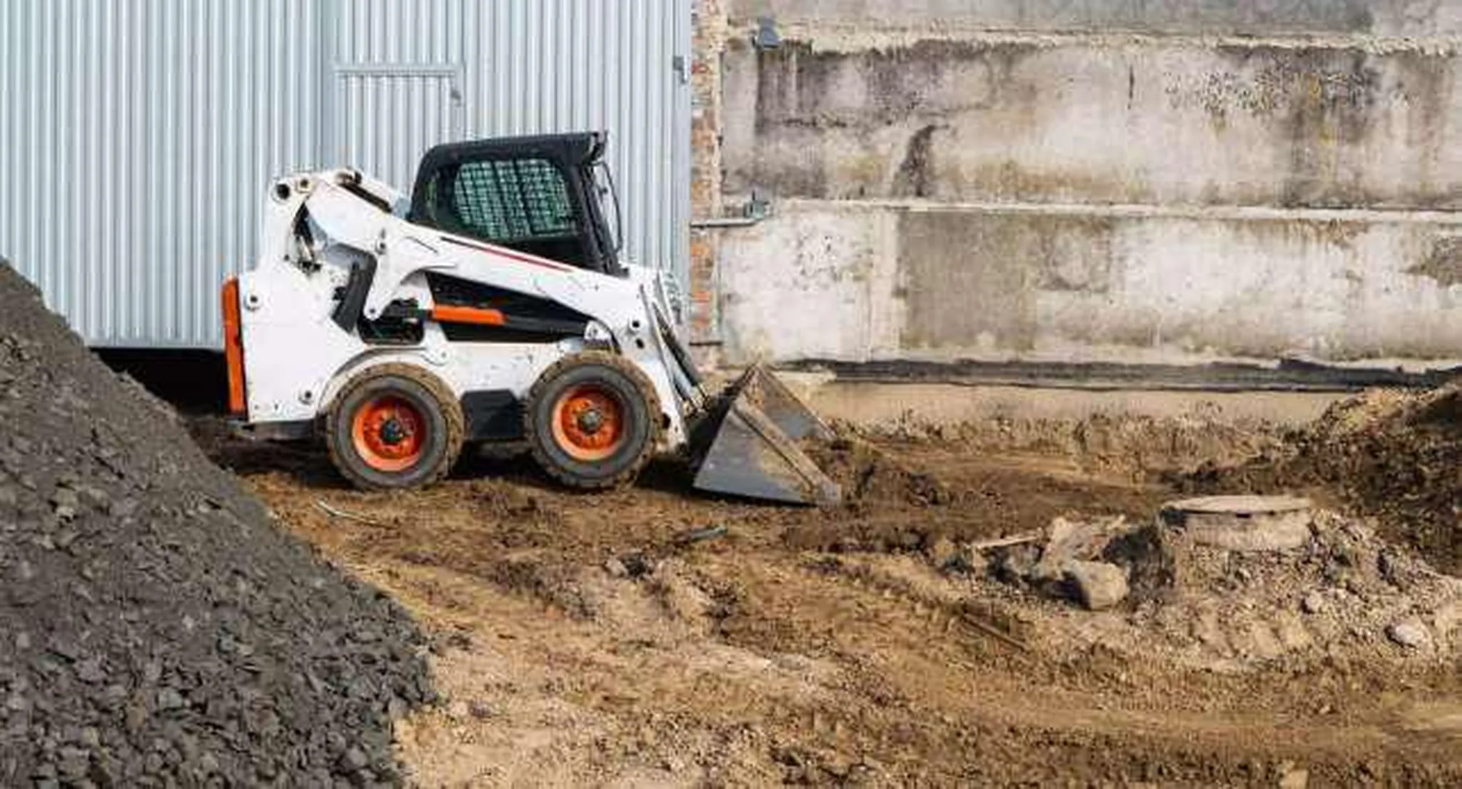 Bobcat performing site work