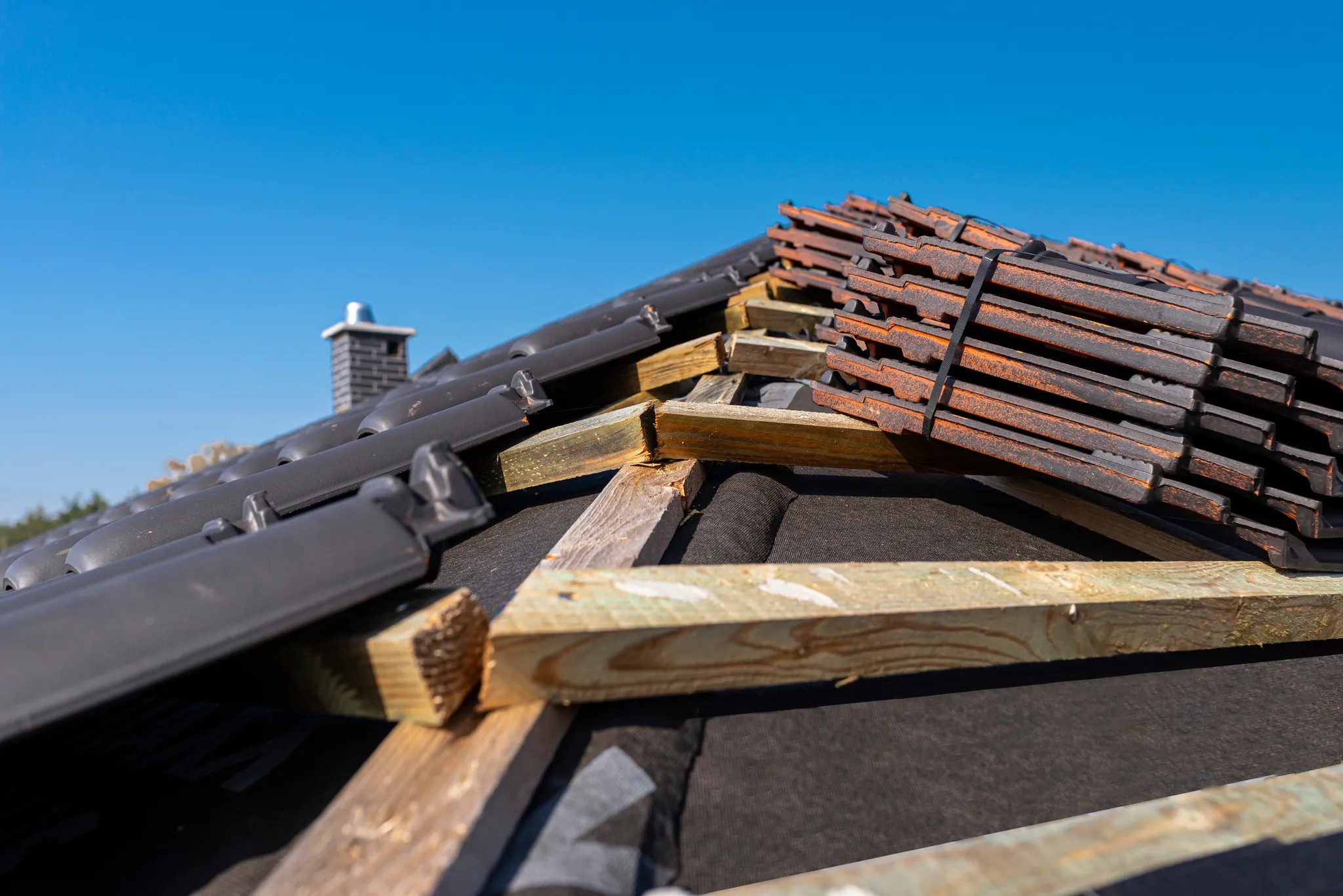 A-Force crew performing a roof removal and repair in San Jose